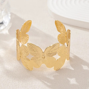 détails du Bracelet Manchette Papillons Dorés