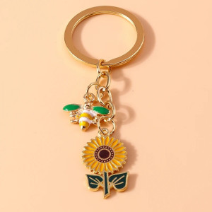 Portachiavi Ape Donna e Girasole – Elegante e Originale