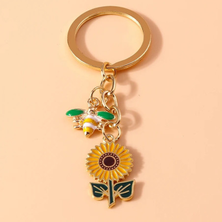 Portachiavi Ape Donna e Girasole – Elegante e Originale