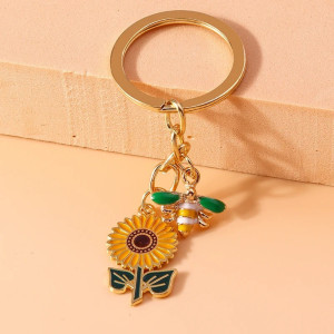 Portachiavi Ape Donna e Girasole – Elegante e Originale