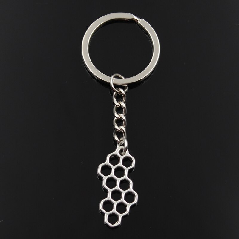 Porte-clés abeille couleur argent en forme de nid d'abeille