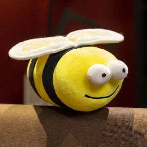 Peluche abeille blanche très douce avec un petit sourire adorable