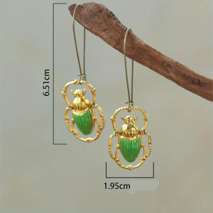 Orecchini Scarabeo Smeraldo Incantato – Gioiello Verde & Oro
