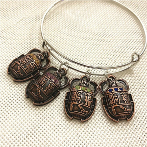 Bracciale Scarabeo Egizio: Talismano Portafortuna Unico