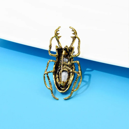Spilla Scarabeo Zaffiro Reale – Gioiello Blu Elegante e Unico