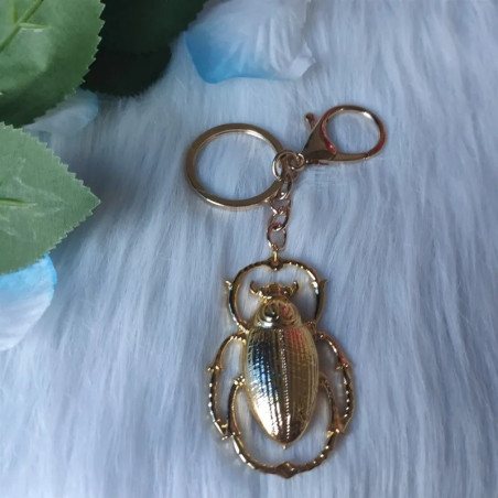 Portachiavi Scarabeo Cromato – Riflessi Dorati e Colori Eleganti