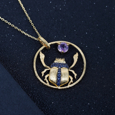 Collana Scarabeo "Danza Solare" – Cerchio Dorato & Cristallo Viola