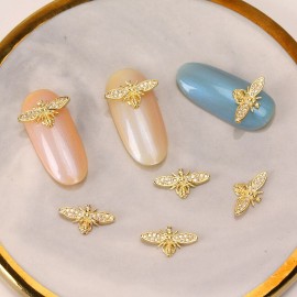 Décorations Nail Art en forme d'abeille 3d doréee avec strass avec des paillettes