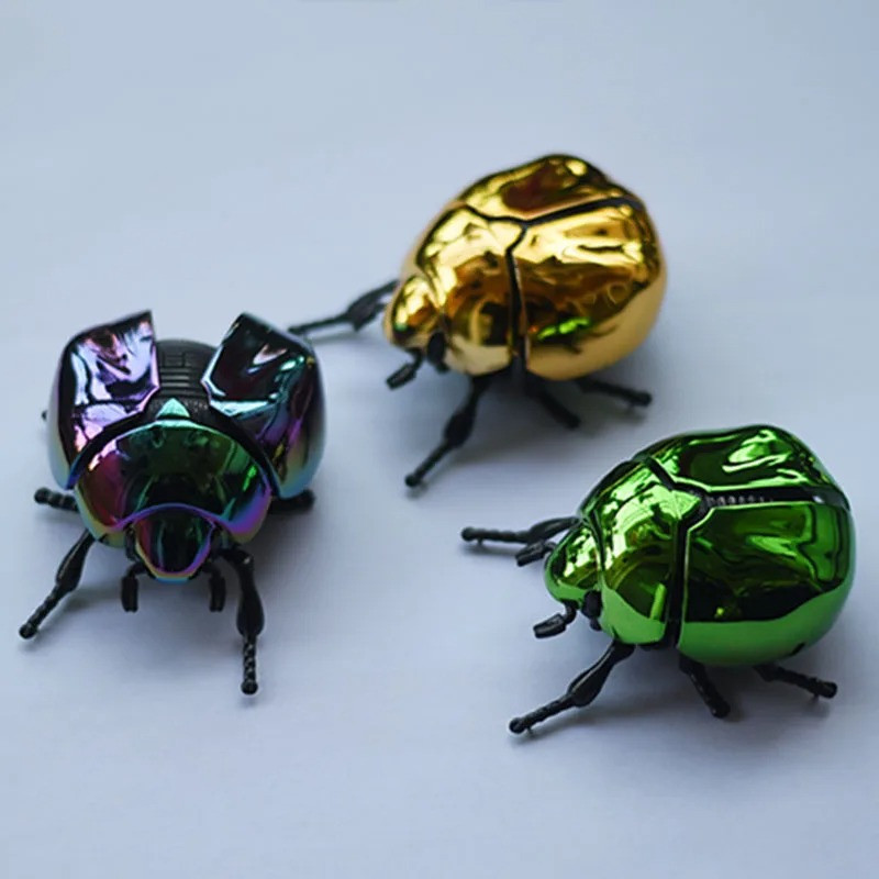 Scarabeo Meccanico a Carica - Riflessi Cromati | 3 Colori