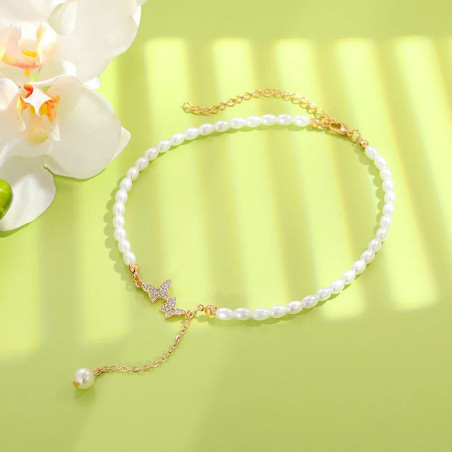 Collier papillon Perles blanches et vol de 2 papillons à strass