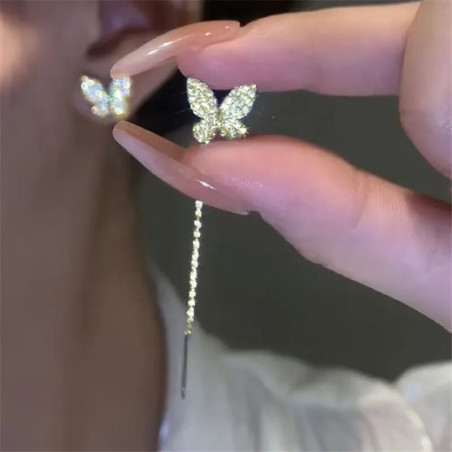 Boucles d'oreilles papillon en or et argent avec long pendant