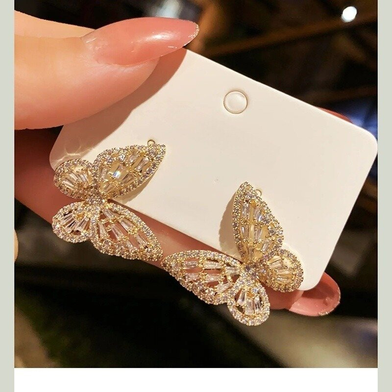 Boucles d'oreilles papillon ailes fines avec strass couleur or