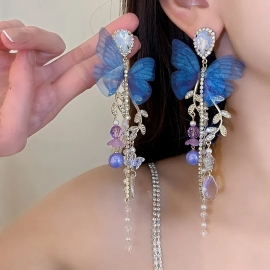Boucles d'oreilles papillon bleu et pendant de cristaux