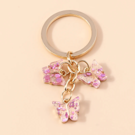 Porte-clés papillon en résine transparente avec paillettes - Couleur Rose
