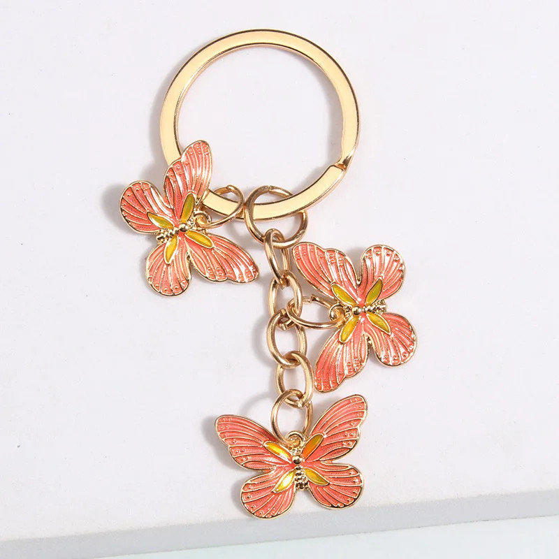 Porte-clés papillon en émail plaqué or - couleur orange