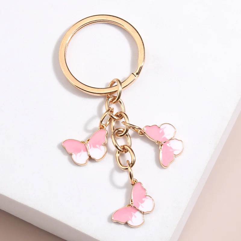 Porte-clés papillon rose et blanc