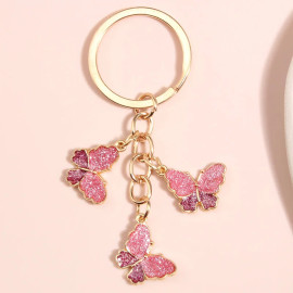 Porte-clés papillon en verre - couleur rose